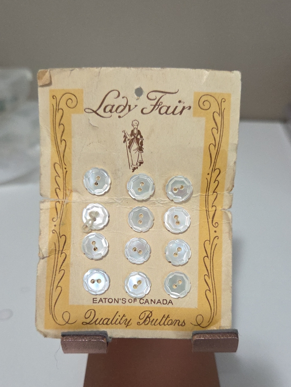 Vintage Eatons Lady Fair Buttons